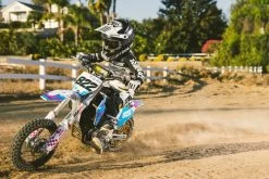 Bell Moto-9 Youth MIPS Twitch Replica 22 Helmet -HJC Store bell moto 9 youth mips helmet on rider 80153.1672397445