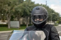 Sena Outrush R Helmet -HJC Store sena outrush r black on rider 05034.1624367425